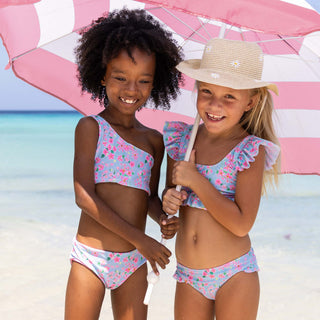 Daisy Chain Swimwear Collection by Snapper Rock. Girls swimwear with a daisy print.